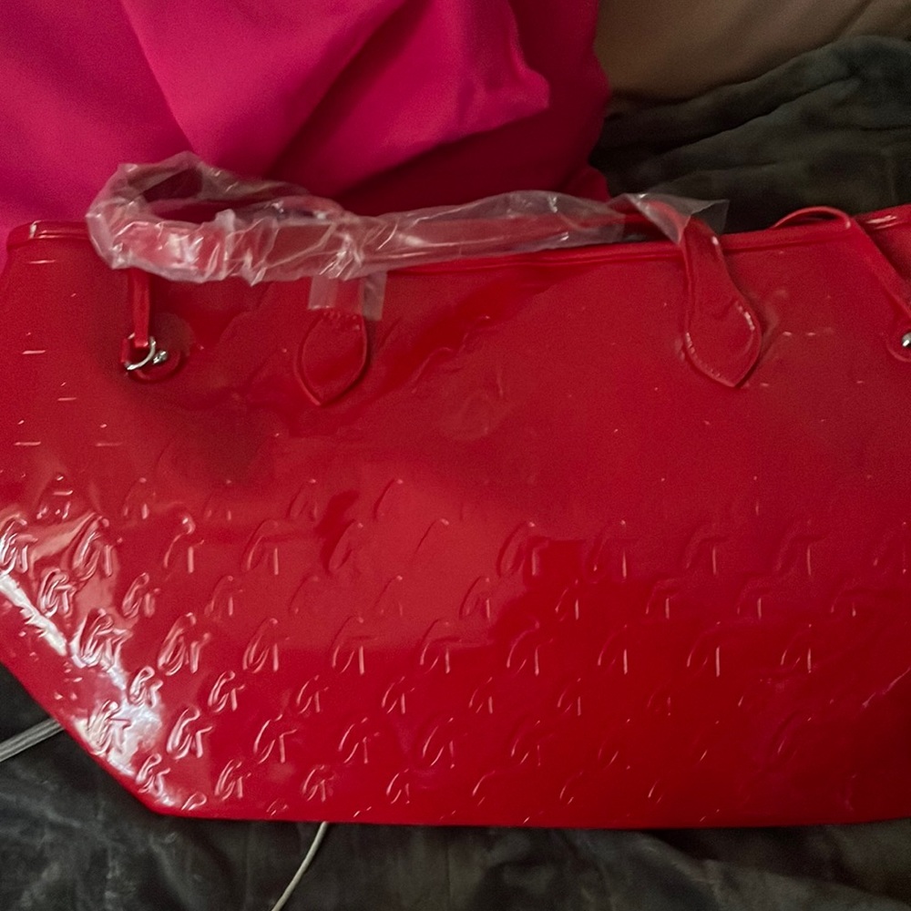 Red patent leather bag brand new